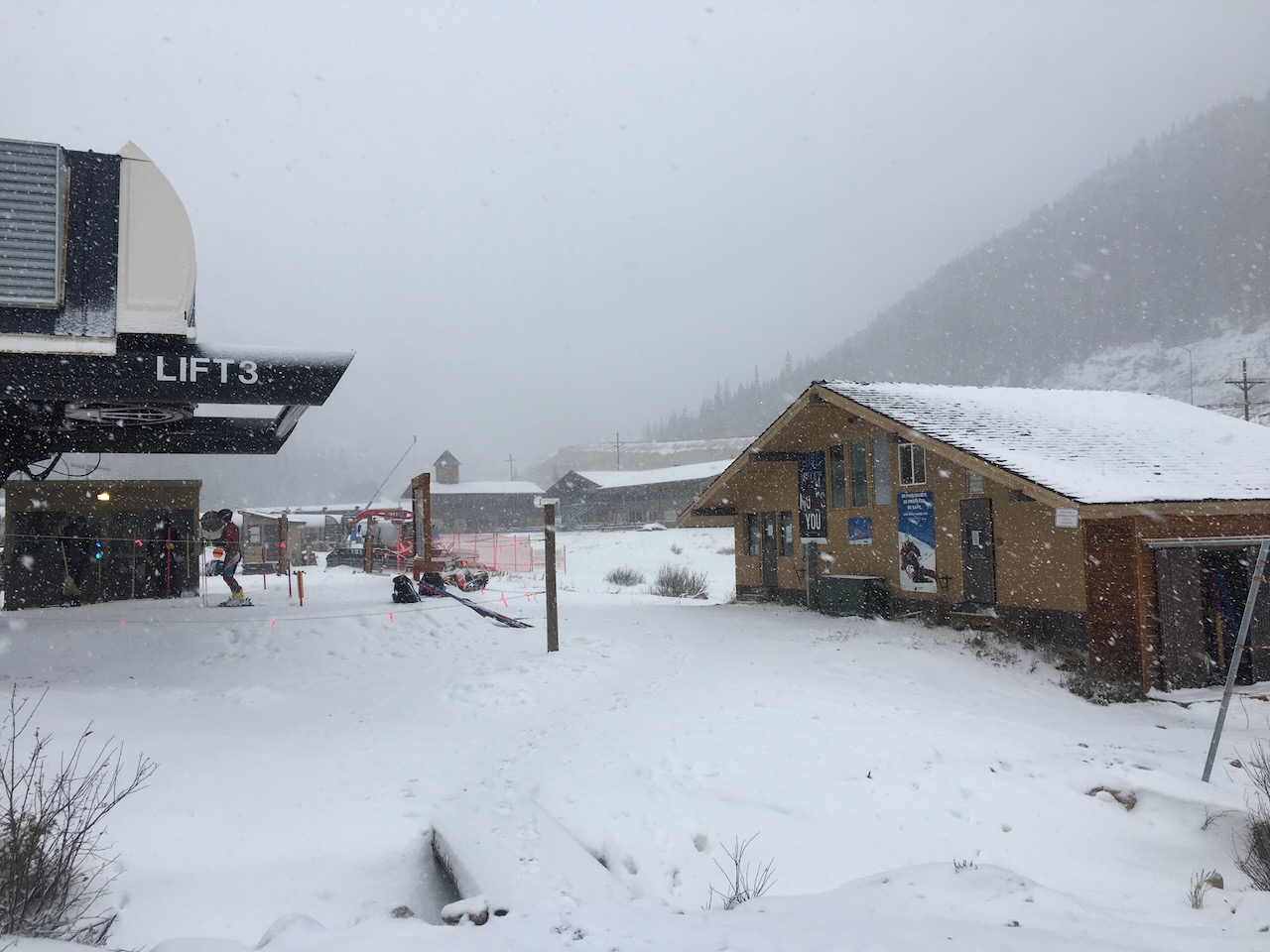 Lift 3 base area in snowfall at Loveland